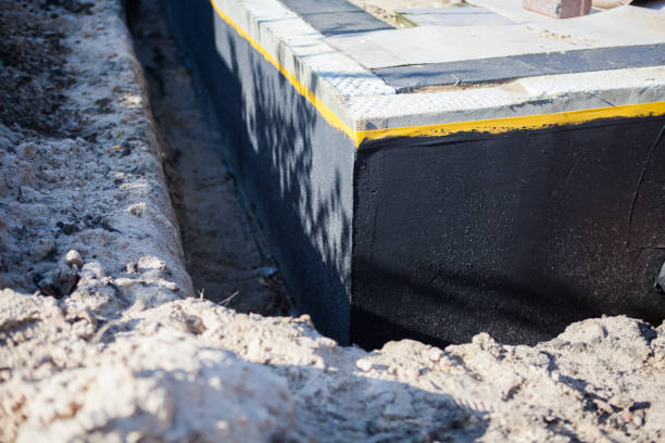 Professional Exterior Waterproofing technician working in Palmyra, NY